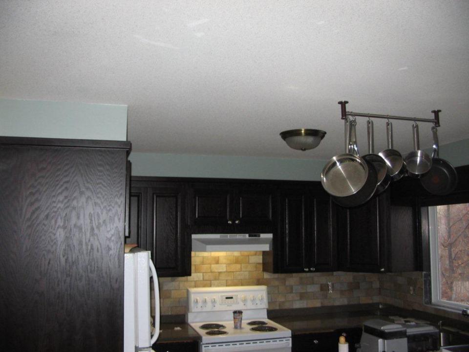 Before tile installed above cabinets